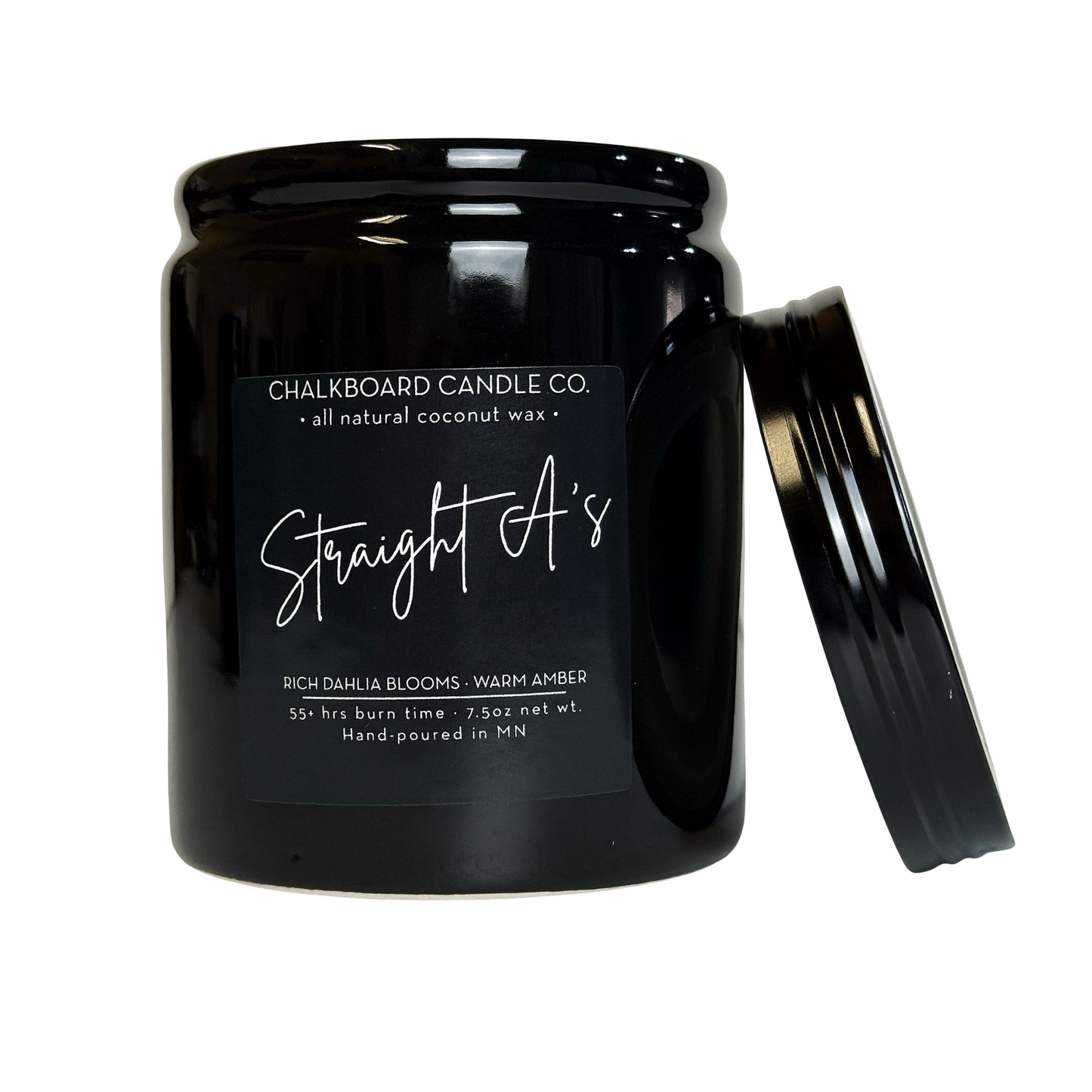Close-up of Straight A’s 10oz black ceramic candle jar showcasing the Chalkboard Candle Co. label with lid leaning on white background