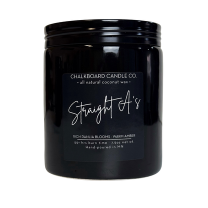 Close-up front of Straight A’s black ceramic candle jar showcasing Chalkboard Candle Co. label and glossy finish on white background